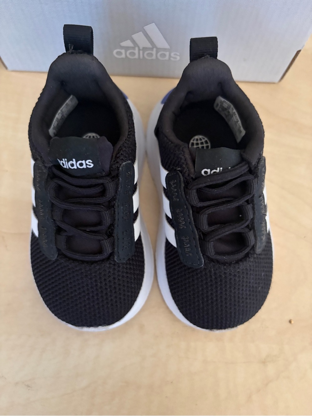 adidas toddler/baby Black and White Slip-On Athletic Sneakers